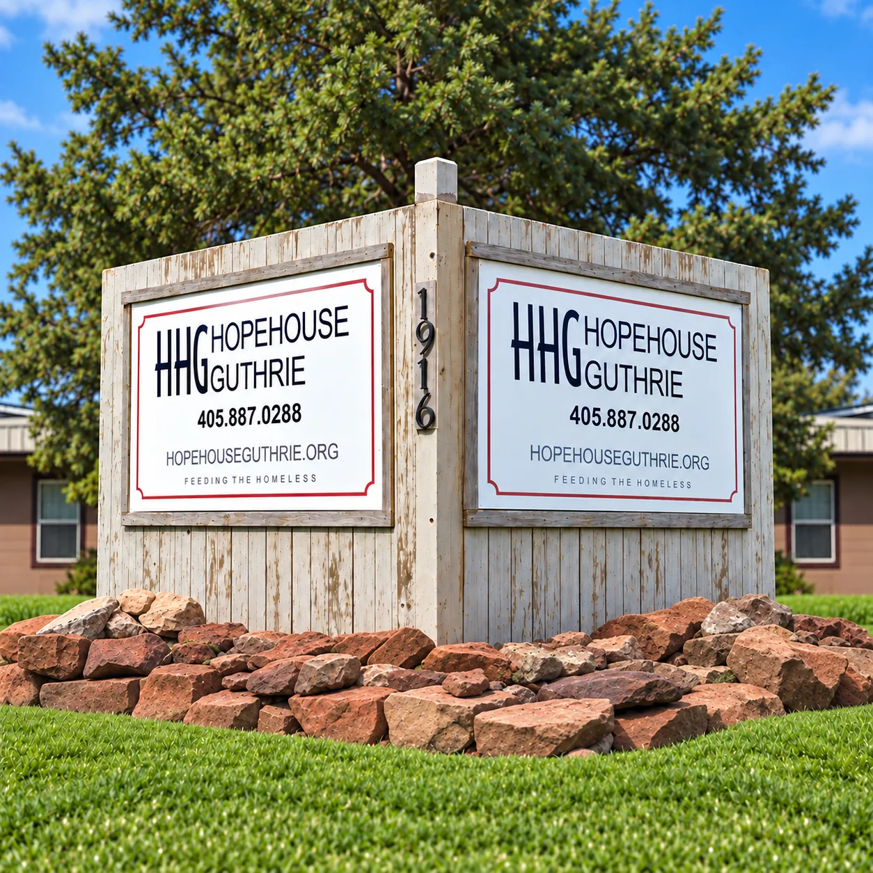 Hope House Guthrie sign at the parking lot entrance